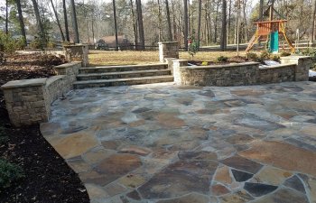 flagstone patio with steps to the garden