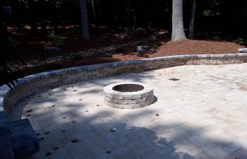 paver patio with a fire pit